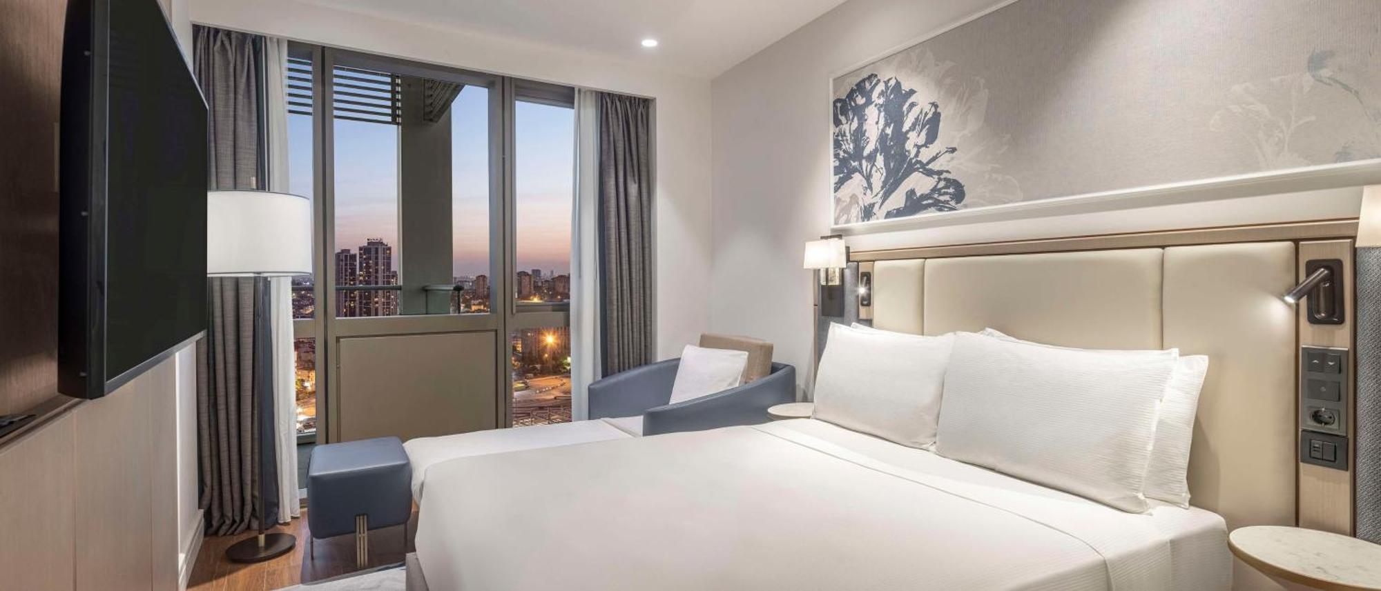 Hilton Mall Of Istanbul Bagian luar foto A bedroom at the hotel