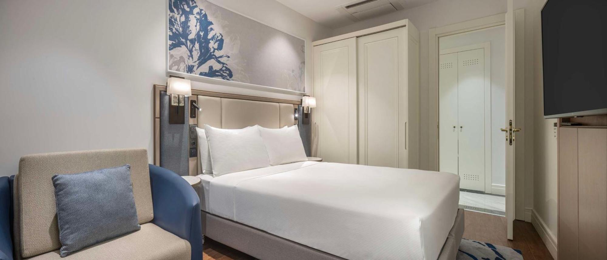 Hilton Mall Of Istanbul Bagian luar foto A bedroom at the hotel