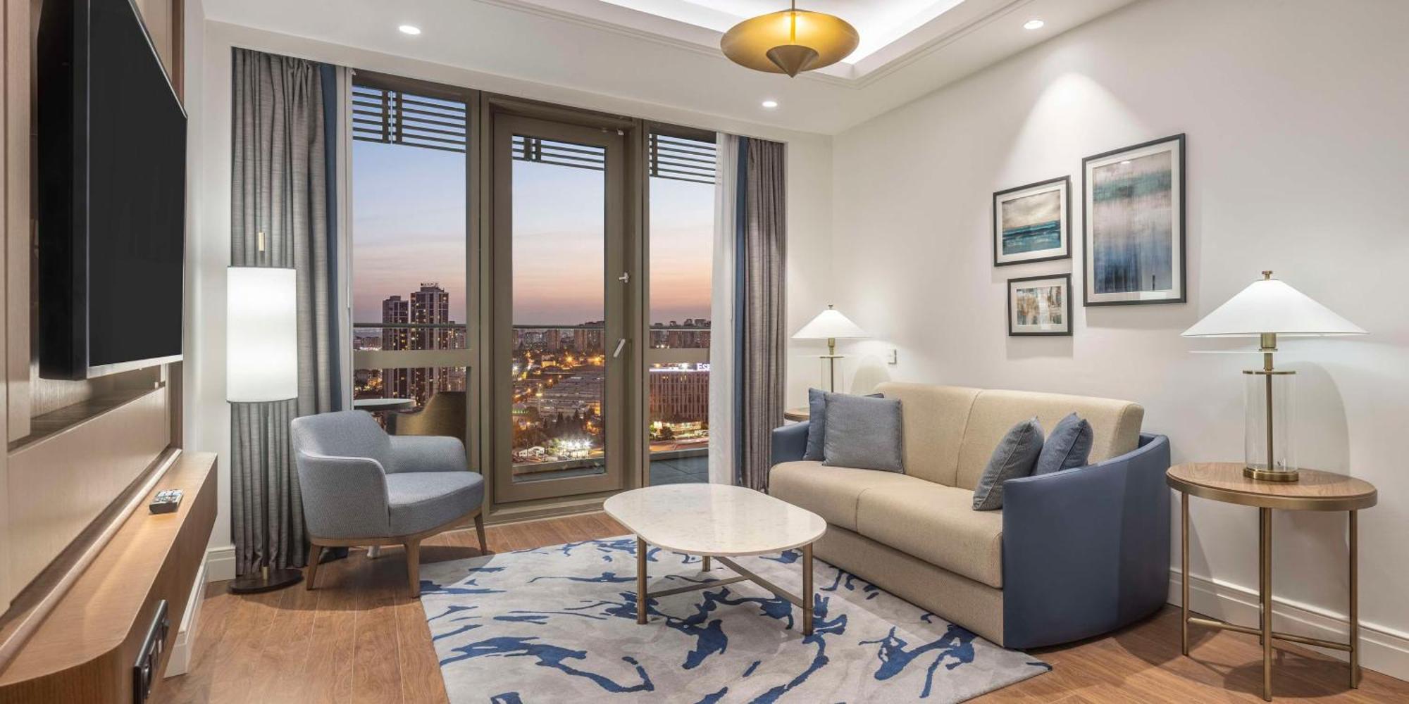 Hilton Mall Of Istanbul Bagian luar foto A living room at the hotel